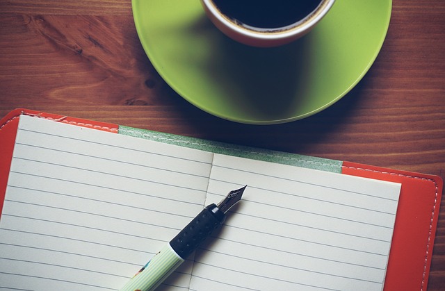 daily budget checklist with pen and coffee on desk Mexico